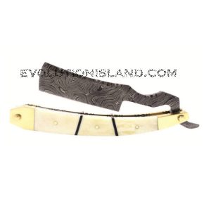 A Damascus Steel Straight Razor with Camel Bone and Brass handle